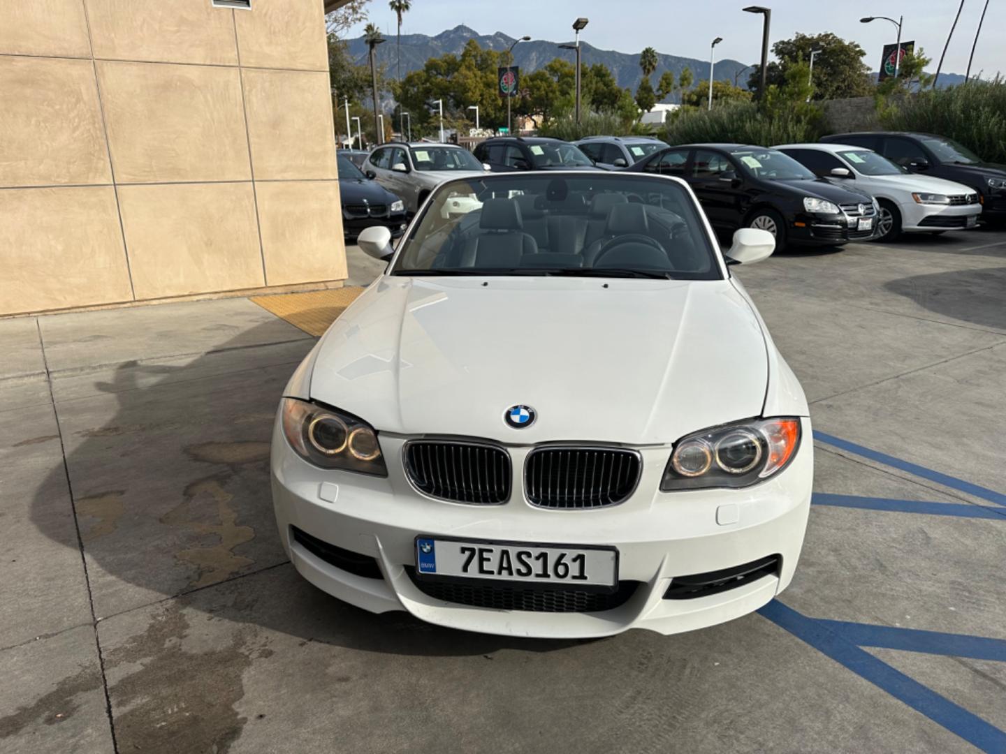 2011 WHITE /Black BMW 1-Series 135i Convertible (WBAUN7C56BV) with an 3.0L L6 DOHC 24V engine, Automatic transmission, located at 30 S. Berkeley Avenue, Pasadena, CA, 91107, (626) 248-7567, 34.145447, -118.109398 - Experience the Ultimate Driving Pleasure: 2011 BMW 135i Convertible Now Available in Pasadena, CA Discover the thrill of open-air driving with the 2011 BMW 135i Convertible, a perfect blend of luxury and performance, now featured at our BHPH dealership in Pasadena, CA. This exquisite convertible - Photo#15